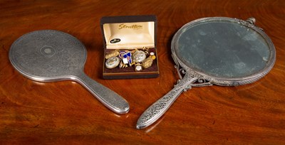 Lot 155 - A Tiffany and Co. silver hand mirror, 12cm...