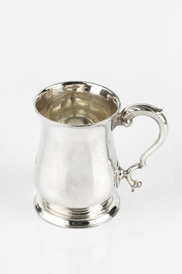 Lot 637 - A George III silver mug, of baluster form,...