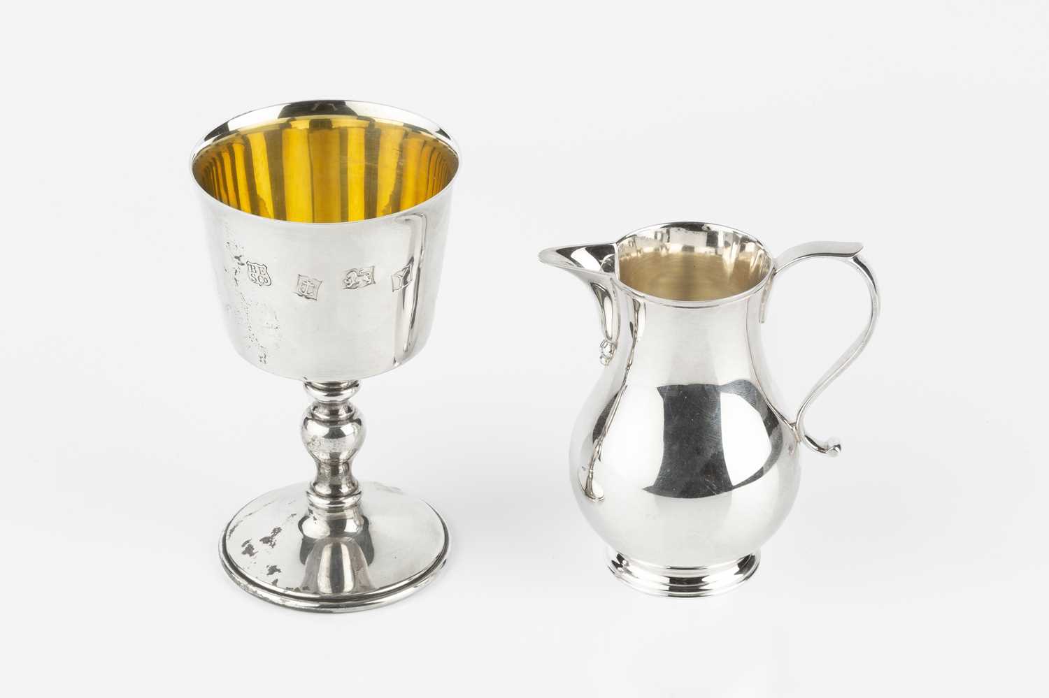 Lot 639 - A silver baluster cream jug, by Bryan Savage,...