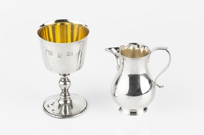 Lot 639 - A silver baluster cream jug, by Bryan Savage,...