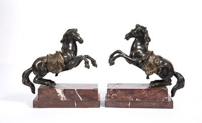 Lot 175 - A pair of 18th century French bronze rearing...