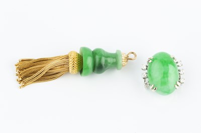 Lot 171 - A jade and diamond pendant, the oval jadeite...