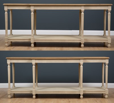 Lot 224 - A pair of breakfront console tables with oak...