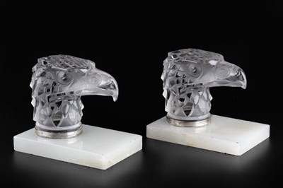 Lot 133 - René Lalique (1860-1945) A pair of Tete...