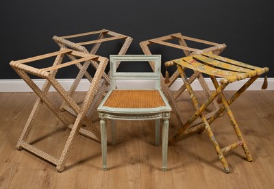 Lot 598 - A dressing table stool and four luggage racks