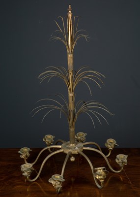 Lot 134 - A brass eight branch chandelier, with three...