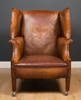 Lot 154 - A Georgian style brown leather upholstered...