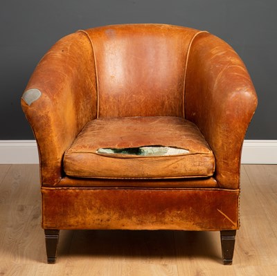 Lot 291 - A contemporary leather tub armchair with squab...