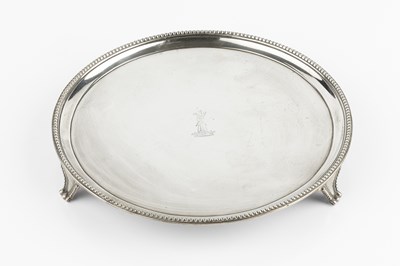 Lot 686 - A George III silver circular waiter, with...