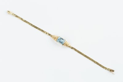 Lot 169 - A blue topaz and diamond set bracelet, the...