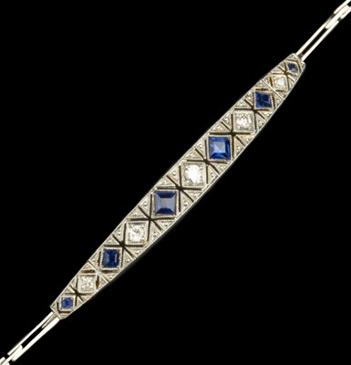 Lot 246 - A sapphire and diamond set panel bracelet, the...