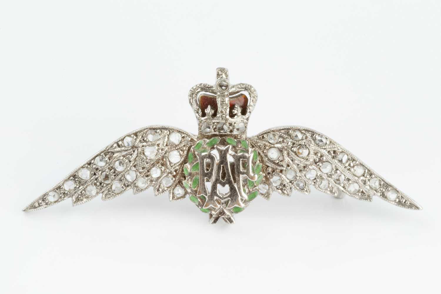 Lot 147 - A diamond and enamel RAF wings brooch,...
