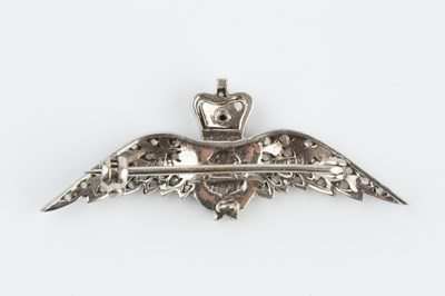 Lot 147 - A diamond and enamel RAF wings brooch,...