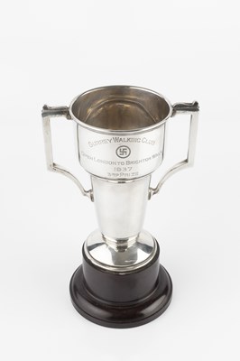 Lot 701 - A silver twin handled trophy cup, inscribed...