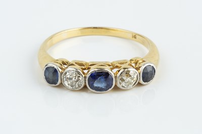 Lot 186 - A sapphire and diamond five stone ring, the...