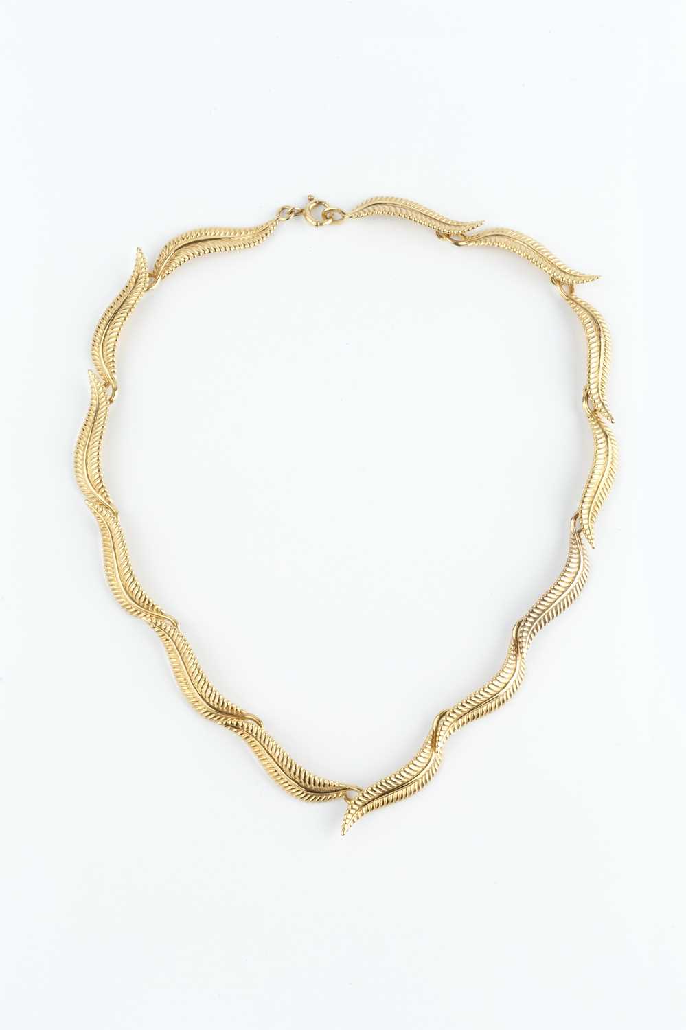 Lot 174 - A 9ct gold collar necklace, designed as a...