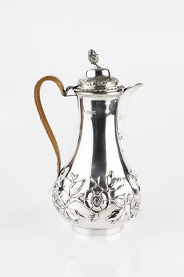 Lot 703 - A late Victorian silver baluster hot water pot,...