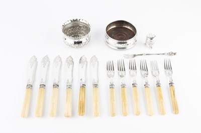 Lot 712 - A set of six Edwardian silver fish knives and...