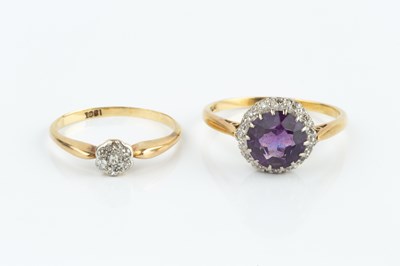 Lot 283 - An amethyst and diamond cluster ring, the...