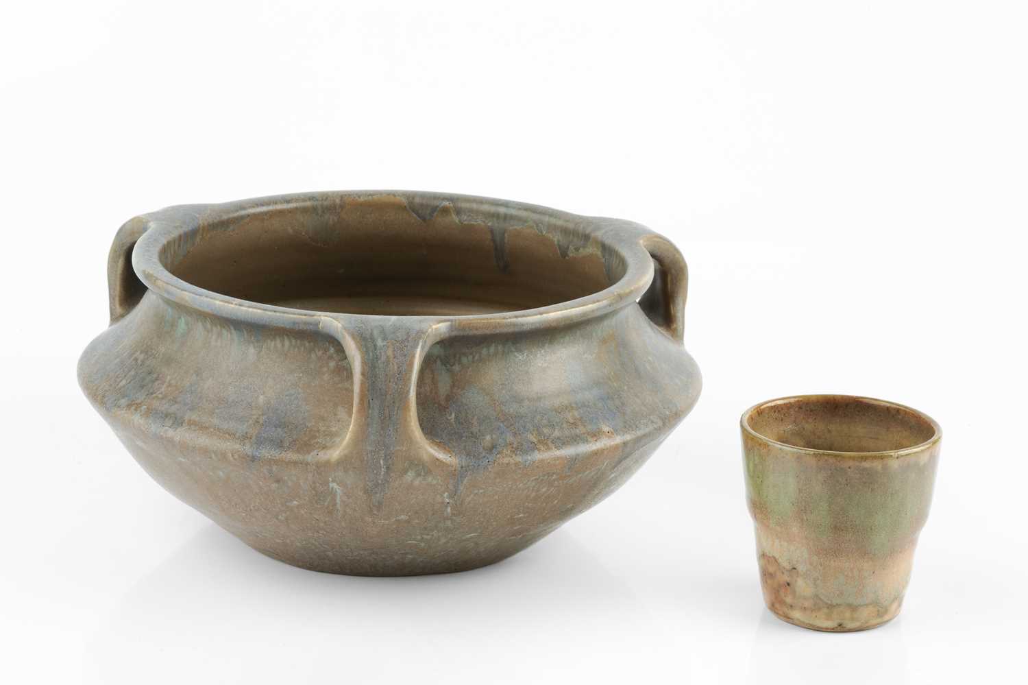 Lot 571 - Upchurch Pottery Bowl mottled purple glaze...