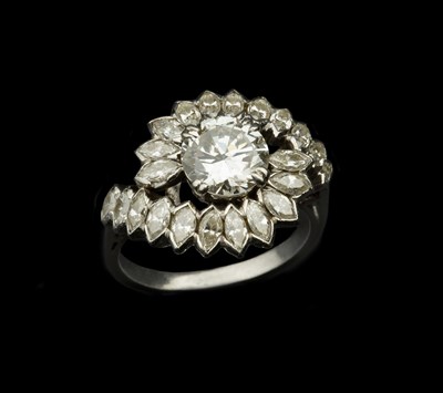 Lot 229 - A diamond cocktail ring, centred with a round...