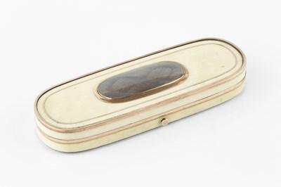 Lot 555 - A Georgian ivory patch box, of elongated oval...