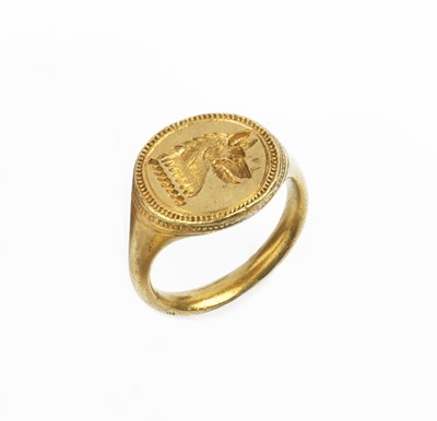 Lot 37 - An antique gold signet ring, the oval panel...