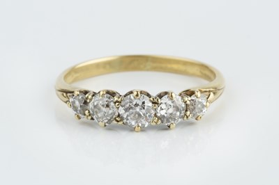 Lot 187 - A diamond five stone ring, the graduated...