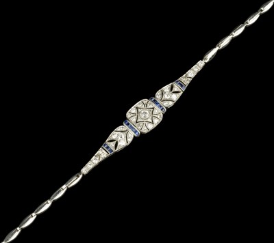 Lot 244 - A sapphire and diamond panel bracelet, circa...