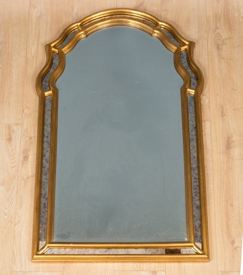 Lot 267 - A modern gold painted arch top mirror with...
