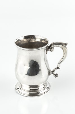 Lot 847 - A George II silver mug, of baluster form, with...