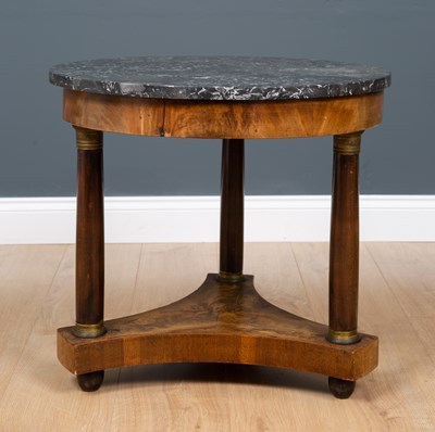 Lot 391 - An empire style continental low marble-topped...