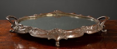 Lot 130 - A spelter and mirror inset surtout de table,...