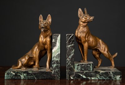 Lot 103 - A pair of Alsatian book ends, gilt spelter and...