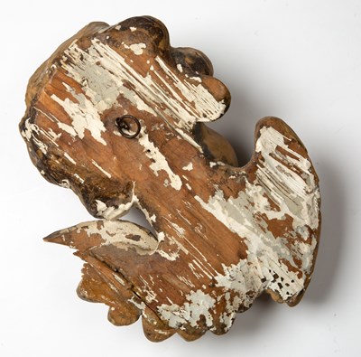 Lot 129 - After Grinling Gibbons, a limewood carved head...