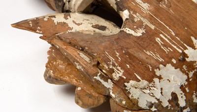 Lot 129 - After Grinling Gibbons, a limewood carved head...