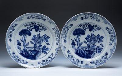 Lot 321 - Pair of Delft blue and white pottery chargers...