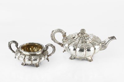 Lot 755 - A George IV silver melon shaped tea pot,...