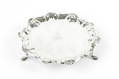 Lot 757 - A George III silver waiter, with scallop and...