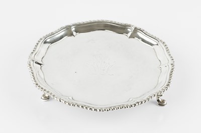 Lot 758 - A George III silver waiter, with shaped and...