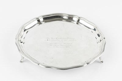 Lot 759 - A silver small salver, with shaped and reeded...