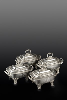 Lot 763 - A set of four George III silver sauce tureens...