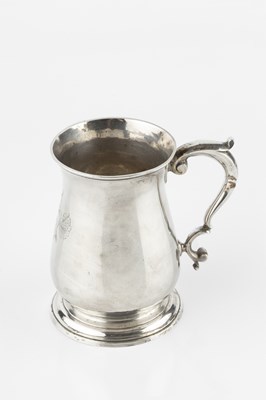 Lot 765 - A George II silver baluster mug, with scroll...