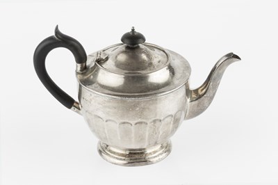 Lot 767 - A silver tea pot, of circular faceted design,...