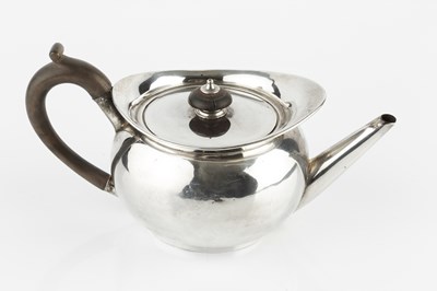 Lot 768 - A George III silver tea pot, of rounded form,...