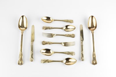 Lot 790 - A service of William IV silver gilt King's...