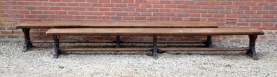 Lot 201 - A pair of Victorian oak long benches with...