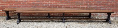 Lot 202 - A pair of Victorian oak long benches with...