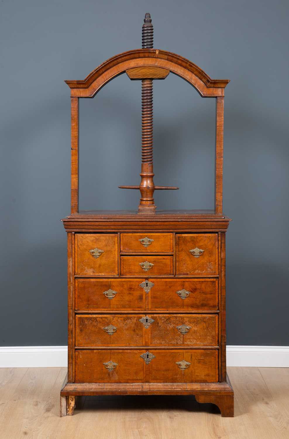 Lot 57 - A George III oak and walnut linen press chest,...