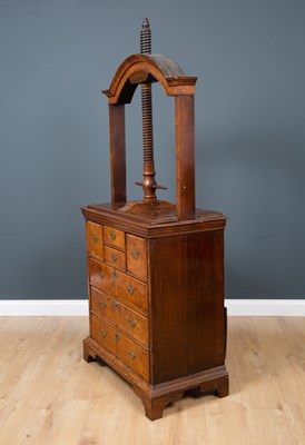 Lot 57 - A George III oak and walnut linen press chest,...